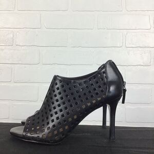 TAHARI  stiletto high heels luxury perforated peep toe pumps black size 6